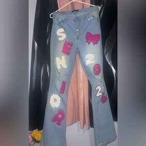 Embellished Light Blue Jeans with Pink and White Accents